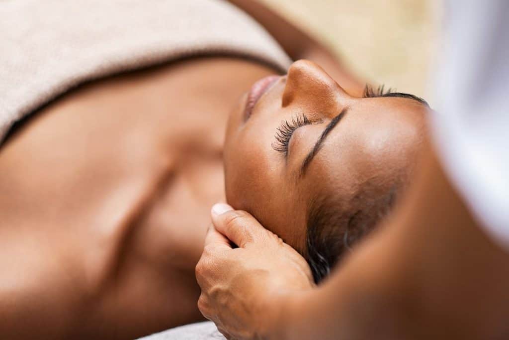 Beautiful,African,Woman,Getting,Face,Massage,In,Beauty,Spa.,Black Beautiful,African,Woman,Getting,Face,Massage,In,Beauty,Spa.,Black